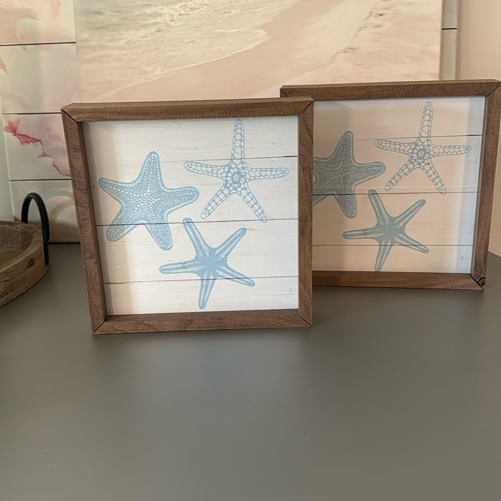 2 Wood Starfish wall hangings measure 9” by 9 “